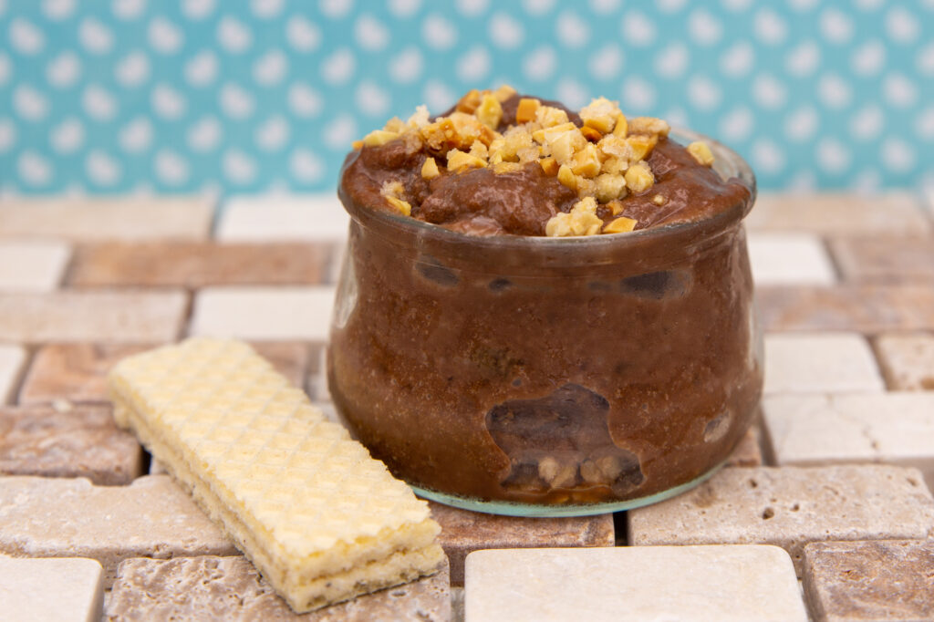Chocolate Nicecream with caramelized nuts and wafer