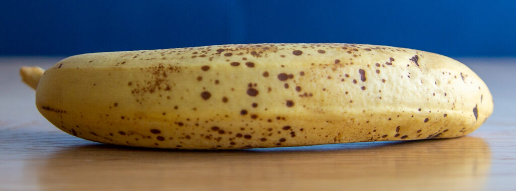 The ripeness of a banana can be recognized by the brown spots