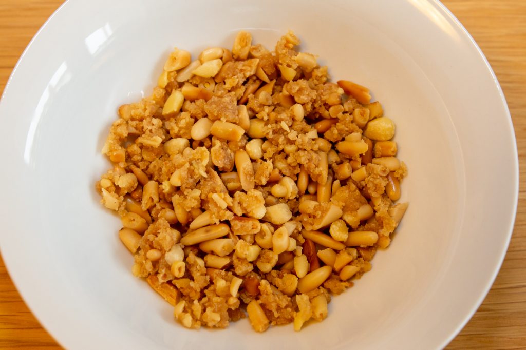 Chopped and caramelized pine nuts