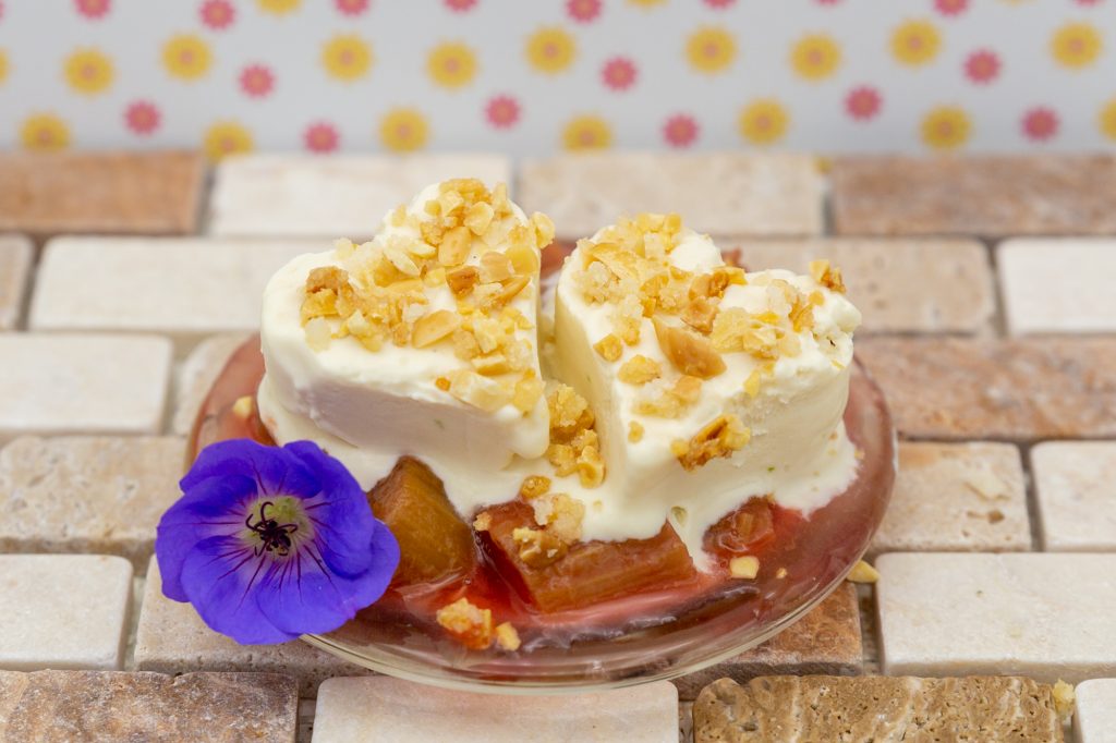 Quark ice cream on rhubarb compote with nut brittle.