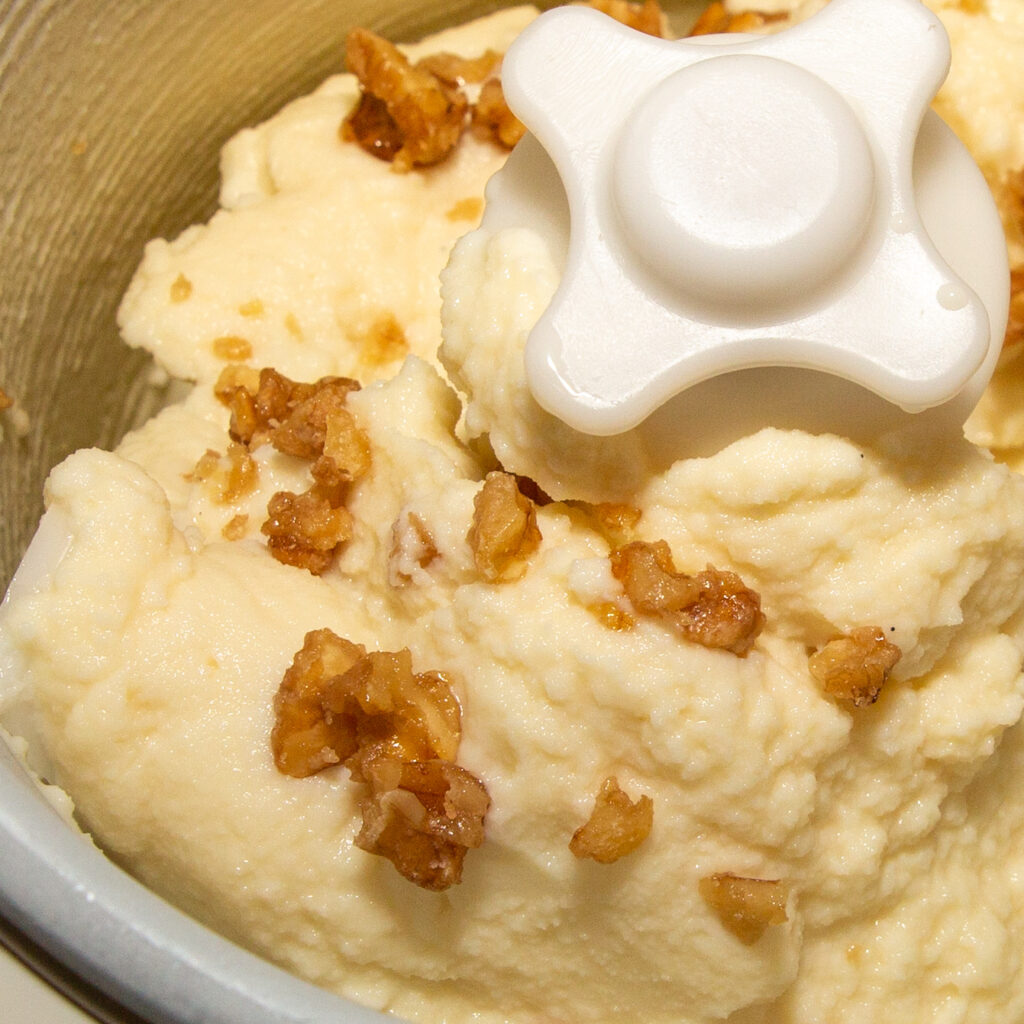 Walnut ice cream Ready-made walnut ice cream fresh from the ice cream maker with caramelized walnuts sprinkled on top.