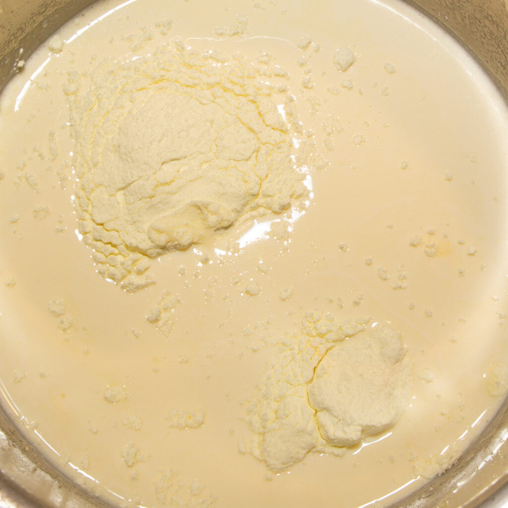 Add the ice cream base to the milk and cream mixture and stir in.