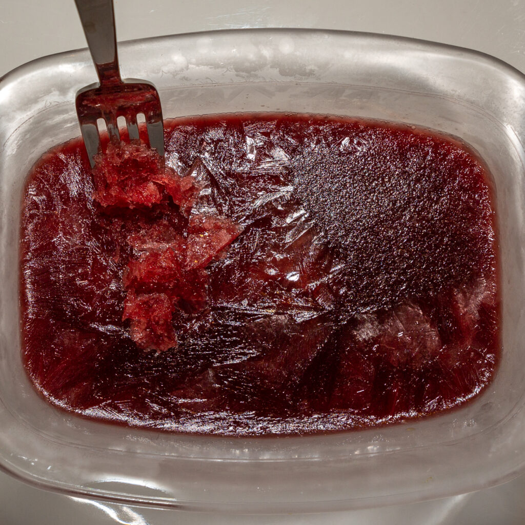 When the ice cream mixture is completely frozen, stir the ice cream block with a fork.