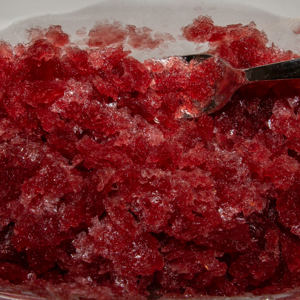 When the ice cream mixture is completely frozen, stir the ice cream block with a fork.